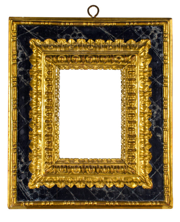 Frame in gold and lacquer in false marble to more orders of carving